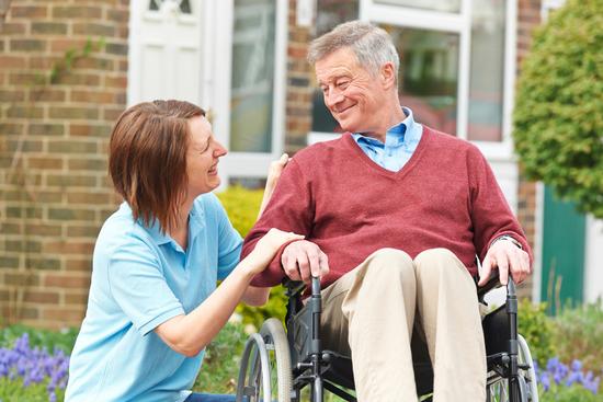 Home care services in Wirral. Reablement and domiciliary care. Man in wheelchair.